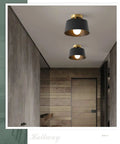 Modern Hallway Ceiling Light Fixture With Gold Plate And Matte Black Shade, Semi Flush Mount Porch Light in a hallway setting