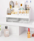White Acrylic Makeup Organizer With Drawers For Vanity And Bathroom Counter Holds Your Glam Haul Secure Plus Multi Compartment Cosmetic Storage For Skincare And Daily Essentials with skincare and makeup displayed.