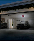 Garage with car illuminated by Universal Garage Door Opener LED Light Bulbs 4 Pack 5000K Daylight White 800 Lumens 60W Equivalent