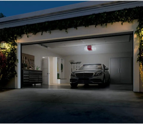 Garage with car illuminated by Universal Garage Door Opener LED Light Bulbs 4 Pack 5000K Daylight White 800 Lumens 60W Equivalent