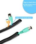 Hella Tough 1/4 Inch Split Wire Loom Tubing For Heavy Duty Cord Protection And Truck Rig Wire Management, flexible black sleeve with cables exiting.