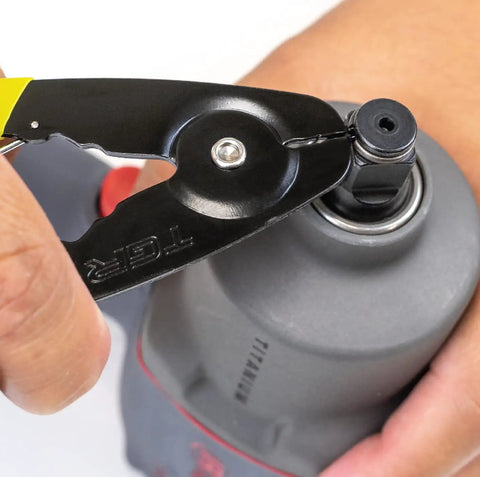 C clip plier removing ring from pneumatic impact wrench, part of 3/8 Inch Drive Socket Retainer Rings With O Ring Set Of 10 For 3/8 Drive