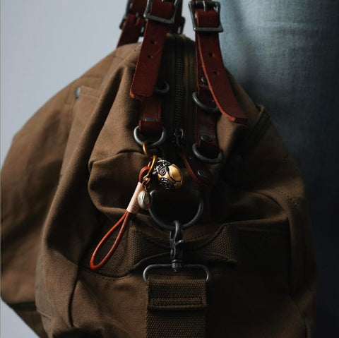 Beating Mechanical Heart Pendant Necklace Steampunk Style Jewelry With Gears And Vascular Details on brown bag