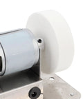 Close-up of Jiawu 100W Mini Bench Grinder With 7-Speed Control And Adjustable Motor showing motor and precision wheel for polishing.
