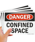 Danger Confined Space OSHA Sticker Labels 5x7 Inch 5 Mil Laminated Polyester With SuperStick Adhesive Red Black White Pack Of 4 Made In USA UV And Chemical Resistant Overlaminated Durable Round Corner Die Cut shown in hand