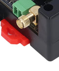 Close-up of GSM Gate Opener Remote Control Access System With Mobile App Management, showing gold connector and ABS casing.