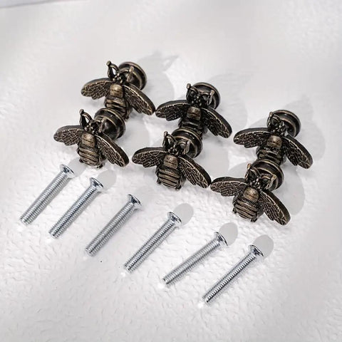 6 Vintage Bee Cabinet Pulls Set Antique Polished Beehive Drawer Handles For Home Decor And Kitchen Cabinets Retro Furniture Knobs Hardware shown with screws on a white surface.