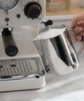Retro Dope Semi Automatic Espresso Machine For Home Or Cafe White Metal Body With Steam And Tea Function milk frothing close-up