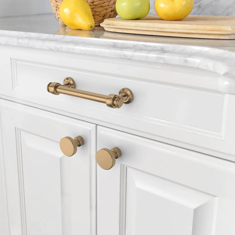 Champagne Bronze Cabinet Pulls 10 Pack With 3.75 Inch Hole Centers Durable Solid Cabinet Handles installed on white kitchen drawers IH0005