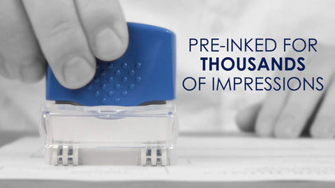 Zero Sweat Paperwork Processing With This Dead Simple Pre Inked Office Approval Stamp in use, showing blue stamp cap and clear base.