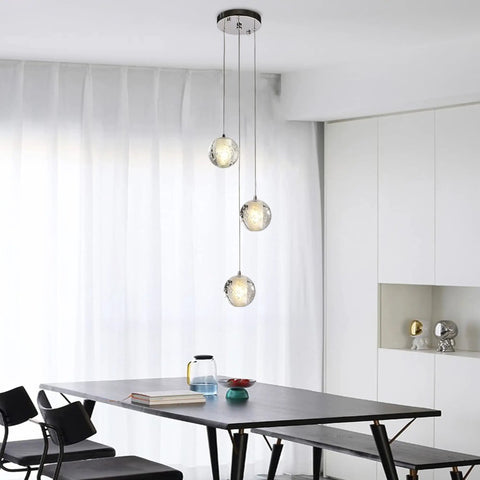 Three Light Bubble Orb Pendant With Chrome Finish Crystal Raindrop Cluster Chandelier for kitchen island in modern dining room.