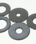 Five Rock Solid Insert Ring Set For Router Table Upgrade, sizes 0.5 to 1.5 inches, durable black plastic, essential woodworking accessory.