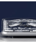 Close-up of Portable Ultrasonic Cleaner For Jewelry Eyeglasses Retainers And Watches Pink with glasses submerged in water.