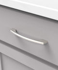Solid Core Stainless Steel Cabinet Pulls, 5-1/16 Inch Hole Center, 128mm, installed on a gray kitchen drawer, Greenwich Collection