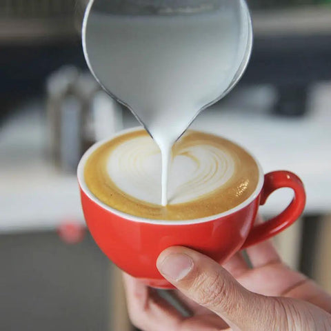 Stainless Steel Milk Frothing Pitcher For Latte Art 12 Ounce Barista Grade Pouring Jug Creamer For Espresso Foam in use