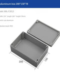 Cast aluminum IP66 junction box, 200x130x78 mm, angled front view with lid removed.