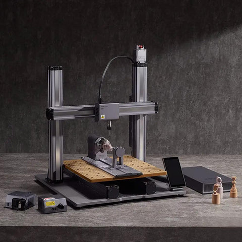 Next Level Rotary Module For Your Desktop Maker Machine featuring CNC engraving setup with wooden base and electronic components.
