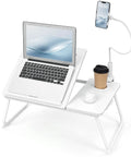 White Adjustable Laptop Desk For Bed With Storage Drawer And Phone Stand 23.6 Inch large surface with laptop, phone holder, and coffee cup.