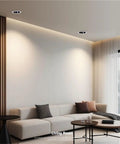 Living room featuring 12 Pack Recessed Downlights With 7W Or 12W Choices 3CCT Dimmable 3000K To 6000K Narrow Edge Anti Glare Baffle Trim.