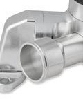 Close-up of Beefy Billet Aluminum Electric Water Pump, showing inlet and outlet fittings for efficient engine cooling.