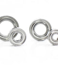 Pro Grade Carbon Brush Micromotor Handpiece Ball Bearing Kit For Electric Nail Drills 210 102L 105L 1480 1260 940 RPM Four Piece Set Delivers Smooth Quiet Operation And Long Lasting Performance For Your Nail Drill Workhorse., four silver ball bearings on white background