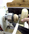 Premium Brazed Carbide Parting And Grooving Tool For Wood Turning Lathe in use on a wood lathe with aluminum handle.