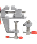 Go To Compact Mini Bench Vise For Jewelry Making And DIY Repairs, silver metal with red caps, 36mm opening, fits 34mm thickness