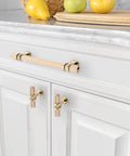 10 Pack Knurled Gold Cabinet Pulls, 5 Inch Center Hole Brushed Brass Handles For Kitchen Cabinets shown on white cabinetry