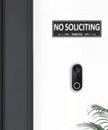 Image of Two Pack No Soliciting Sign For Front Door Aluminum Metal Self Adhesive Built Tough Rust Free No Fade 7.5 By 2.5 Inches High Visibility White On Black Sign For House Home Office Window displayed on a door next to a doorbell.