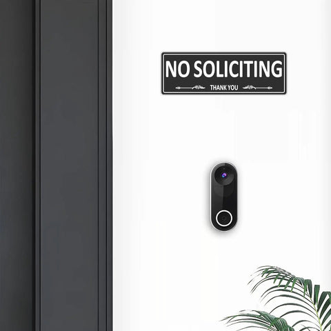 Image of Two Pack No Soliciting Sign For Front Door Aluminum Metal Self Adhesive Built Tough Rust Free No Fade 7.5 By 2.5 Inches High Visibility White On Black Sign For House Home Office Window displayed on a door next to a doorbell.