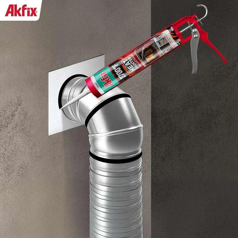 Heat Fighter Black Fireplace Sealant Withstands Up To 2700F Direct Flame Sealing cartridge applied on metal duct joint