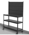 Heavy Duty Pegboard Display Stand With Rollin Wheels, Three Tier Garage Storage Rack For Tools Hardware And Workshop Organizing, Super Tough Black Metal Shelf, side view.