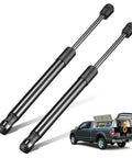 Heavy Duty Universal Gas Struts 12 Inch 45 Pound Lift Supports For Pickup Toolboxes Camper Shells Cabinet Doors Straight Up Reliable Action With Zero Hassle Installs Set Of Two displayed on a pickup truck.