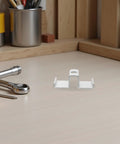 Heavy Duty Galvanized Saddle Clips For Steel Grating on a work surface, showcasing durable carbon steel design and secure fit.