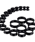 20 Piece Silicone Ear Gauge Kit From 2G To 1 Inch Tunnels Set Thin Black Soft Plugs arranged in spiral formation