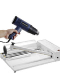 Adjustable hot air gun for heat shrink packaging with manual sealer, aiding in sealing tight for protection.