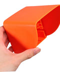 Badass Heavy Duty Ev Charger Cover And Weatherproof Outlet Protector for 86 Type Electrical Jack Plates held in hand, vibrant orange.