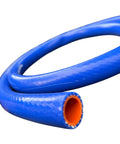 Blue 1-inch silicone heater hose with orange inner lining, close-up view of curled coil