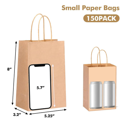 Bulk 150 Pack Brown Kraft Paper Gift Bags With Handles 5.25 x 3.2 x 8 Inches shown with phone and cans for scale
