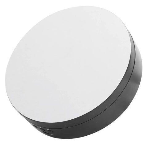 Upgrade Your Game With This Sick Electric Rotating Display Stand Boasting 3 Speeds And 4 Adjustable Angles For Showcasing Jewelry Watches And Cosmetics Like A Boss On A Sleek Black Mirror Surface Turntable Base with black base and smooth mirror top.