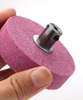 Top Shelf 3 Inch Bench Grinding Wheel And Polishing Disc For Knife Sharpener Drill Bit Grinder showing pink grinding stone with metal shaft.