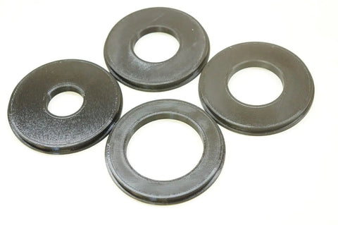 Four Piece Router Table Insert Ring Set Featuring Rock Solid 3.1 Inch Outer Diameter with various inner sizes for precision routing.