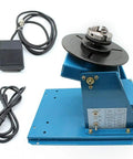 Heavy Duty Rotary Welding Positioner Featuring 110V Power And Smooth Two To Ten Rpm Rotation Compact Mini Turntable For Shops Adjustable Tilt Base Portable Three Jaw Chuck No Hassle Setup Ready To Roll with foot pedal and cables.