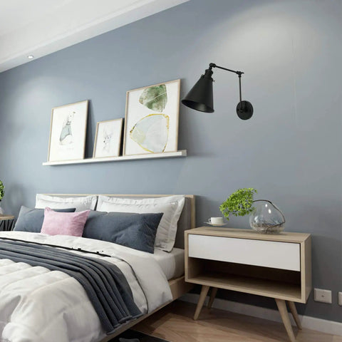 Bedroom with Industrial Black Finish Wall Sconce With Adjustable Arm And E26 Base 1 Light Fixture, above a modern nightstand.