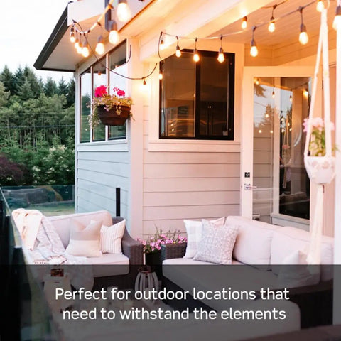 Outdoor patio setup with sofas and lighting, featuring space for Weather-Resistant GFCI Outdoor Outlet 15 Amp With Self Test And LED Indicator.