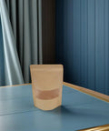 Resealable Kraft Paper Bag with Clear Window on table for Food Storage and Pantry Organization Pack of 50