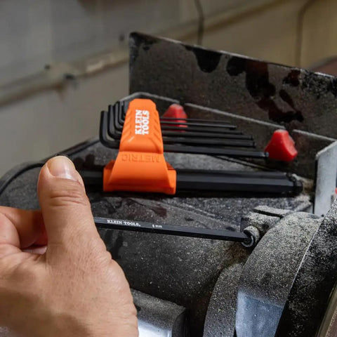 Hand using 22-Piece Long Ball-End Hex Key Wrench Set With SAE And Metric Sizes From 1/16 Inch To 3/8 Inch And 1.5mm To 10mm in shop