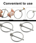 Four Pack 304 Stainless Steel Linch Pins With Ring One Eighth Inch By One And Three Eighths Inch, shown in hand and installed