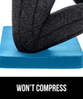Close up of knee resting on Extra Thick Supportive Foam Kneeling Pad 2 Pack, 17 by 11 inch, dirt and water resistant.