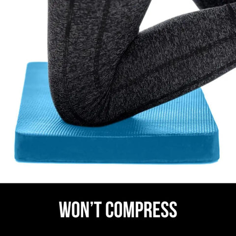 Close up of knee resting on Extra Thick Supportive Foam Kneeling Pad 2 Pack, 17 by 11 inch, dirt and water resistant.